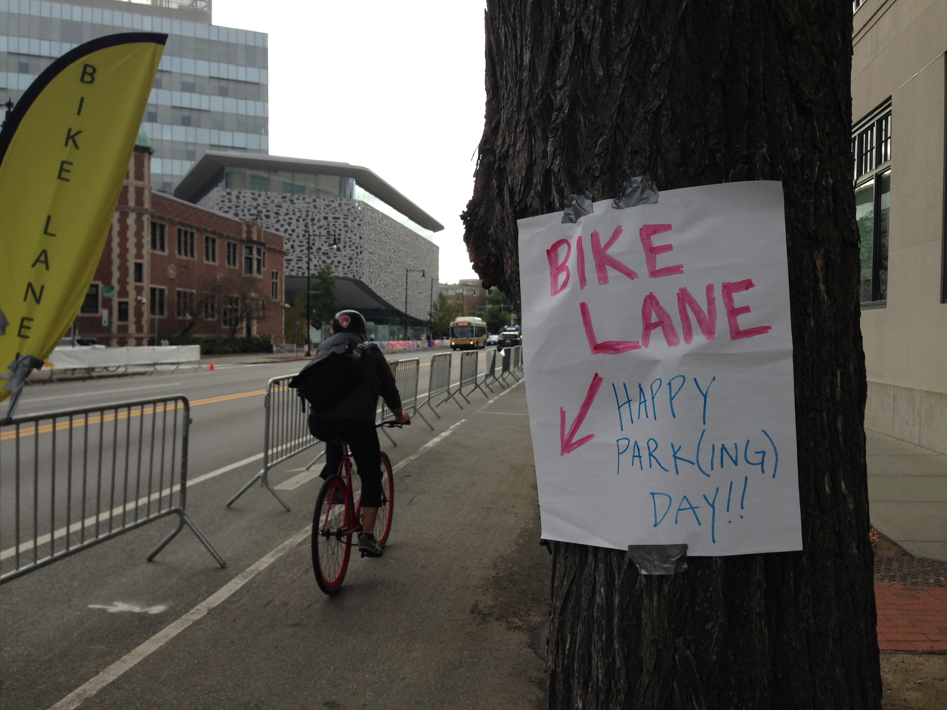 Parking spots repurposed as a protected bike lane
